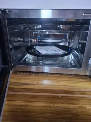 25.L Delonghi Convection Microwave Grill From Uk