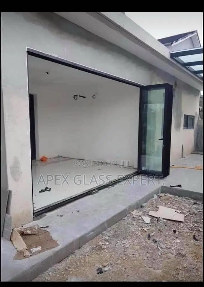 Bifold Framed Glass Door With 10mm Clear Tempered Glass.