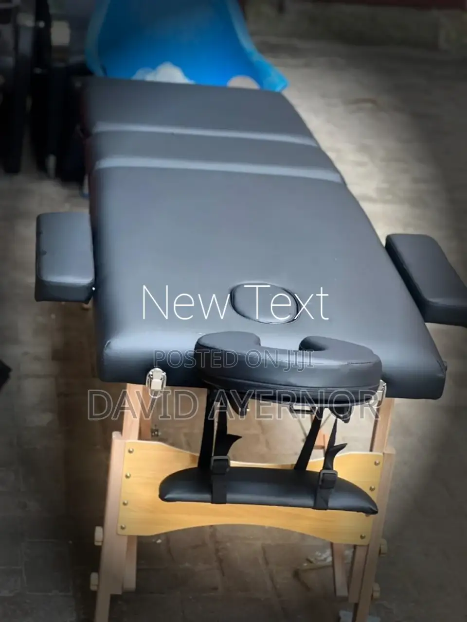 Massaging Table With Wooden Legs.