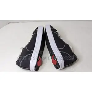 German Heelys Black Canvas Low Top Skate Wheeled Sneaker