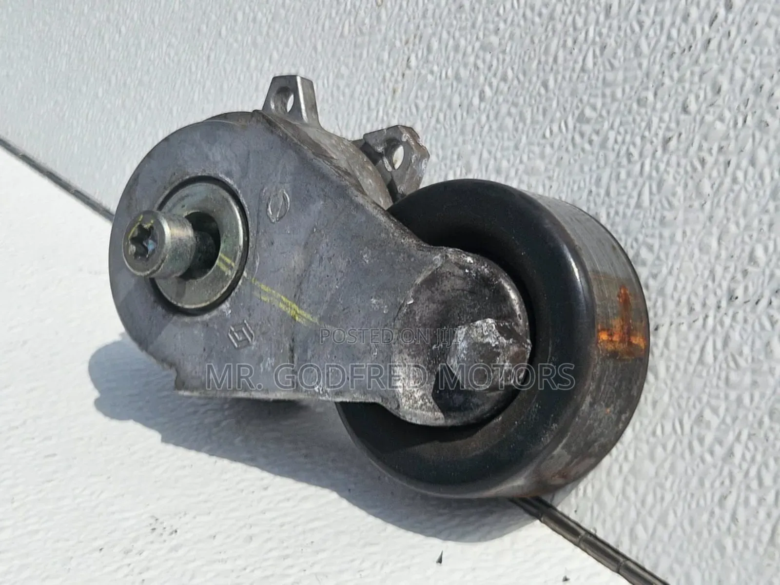 Nissan Sentra 2013-16 Belt Tensioner (Adjuster). Original.
