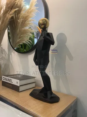 Posing Man With Ball Head Figurine