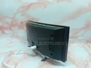 Curved Mirror Alarm Clock