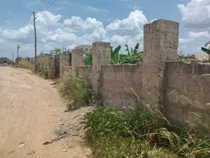 Photo - Uncompleted Building Building on Two Plots of Land