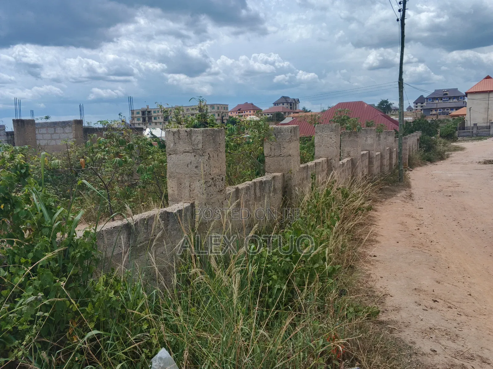 Uncompleted Building Building on Two Plots of Land