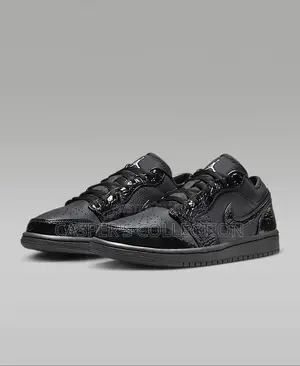 Photo - Air Jordan 1 Low “Black Croc”
