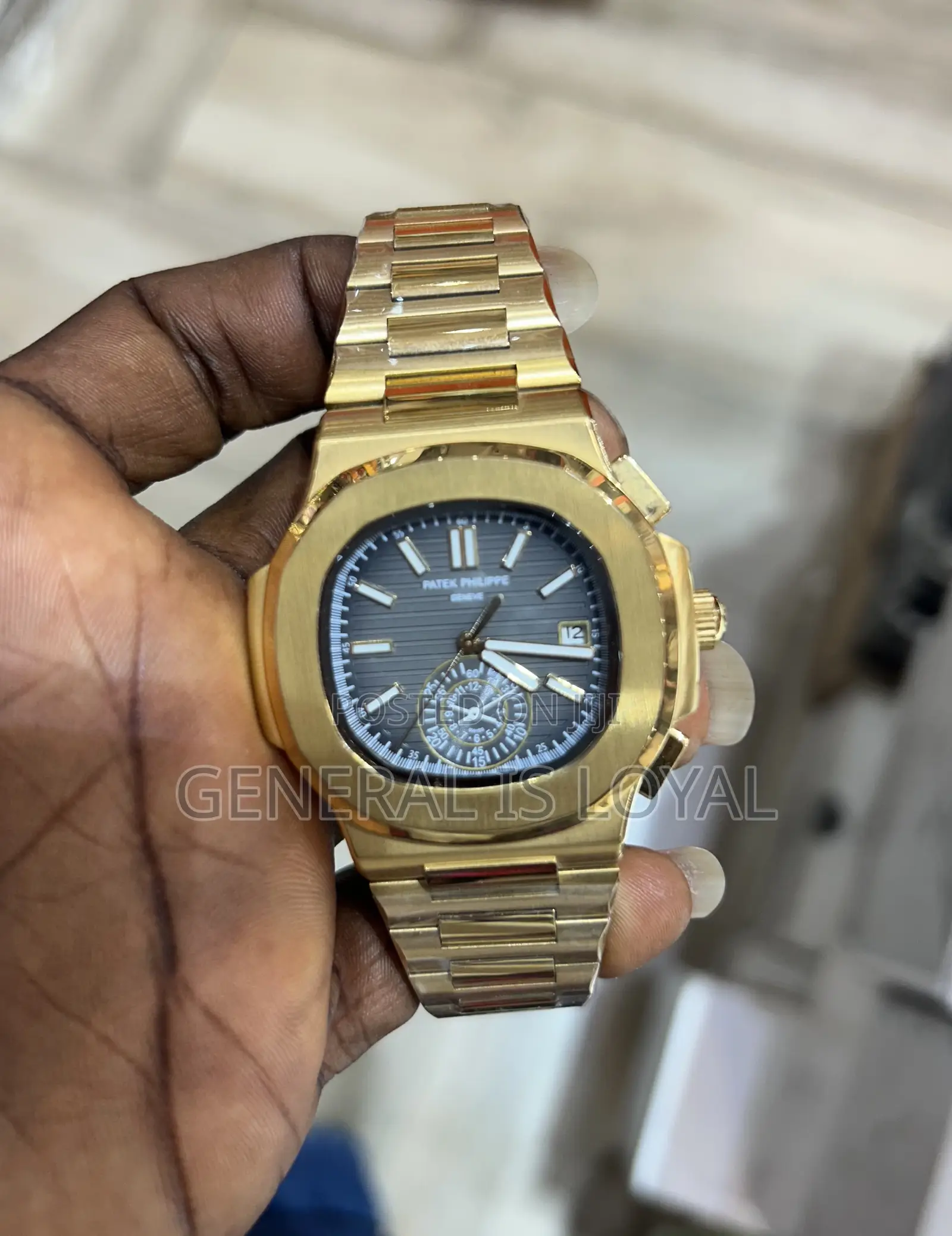 Patek Philippe Nautilus Gold Blue Dial
