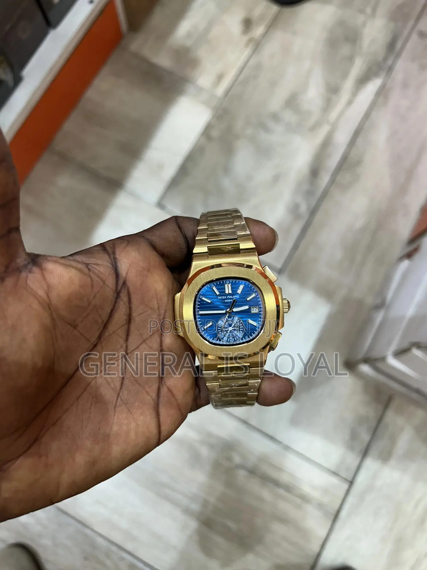 Patek Philippe Nautilus Gold Blue Dial