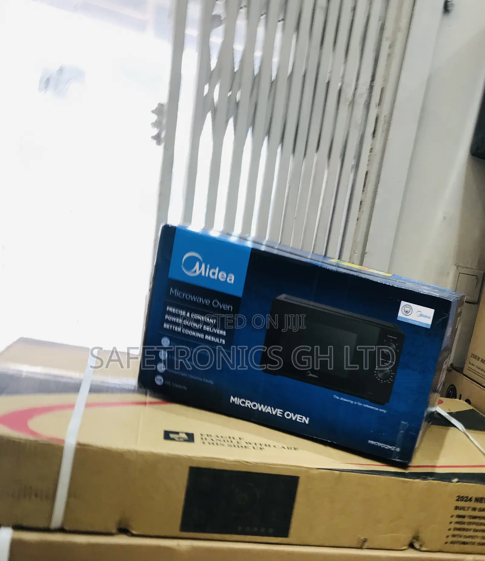 Available Good 20 Liters Black Countertop Midea Microwave