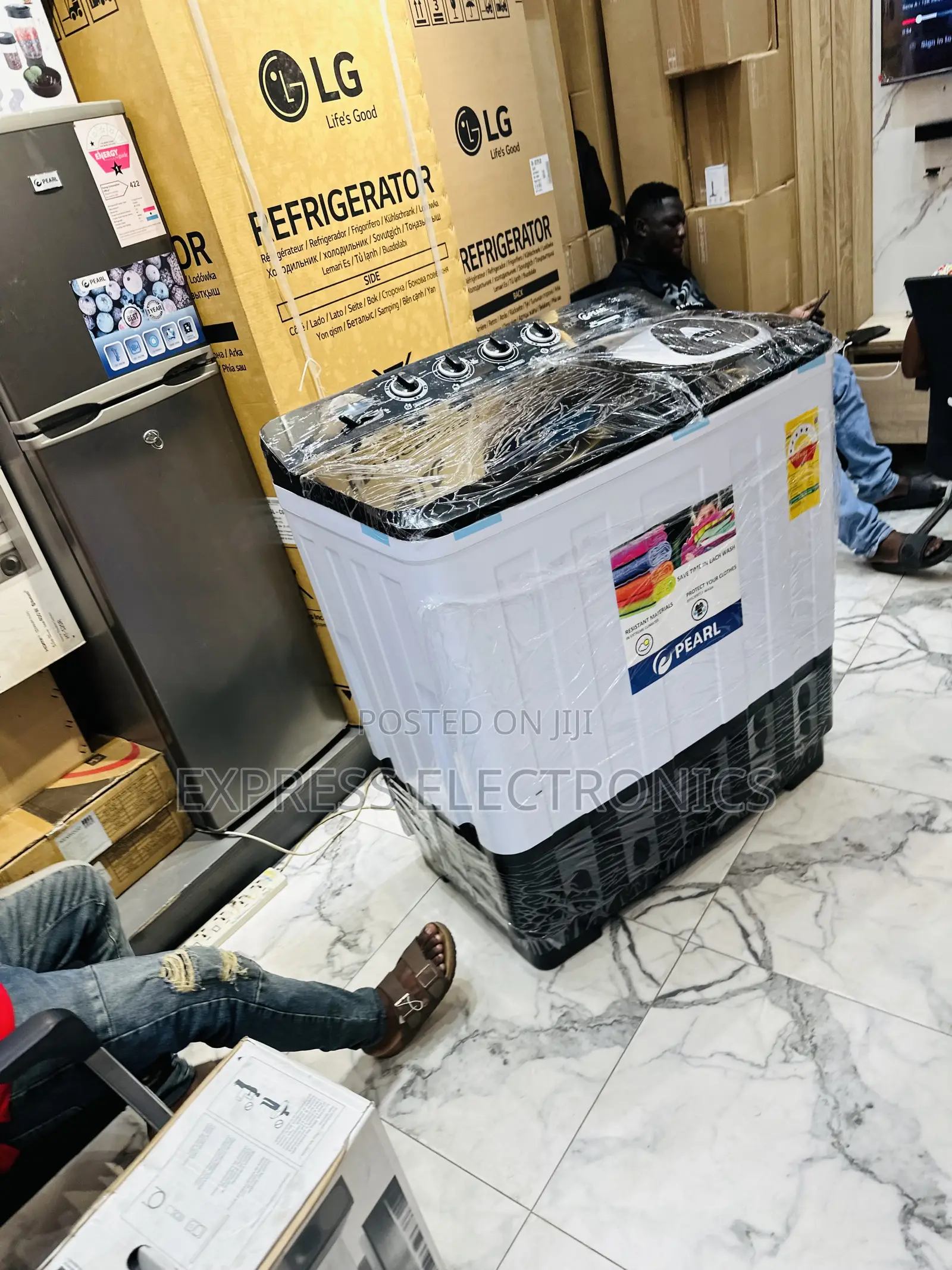 Locate Us at Adabraka Wm Topload Twintub 18kg Pearl