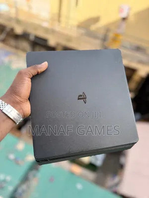 Playstation 4 Slim With 7 and One Controller