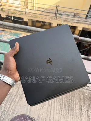 Playstation 4 Slim With 7 and One Controller