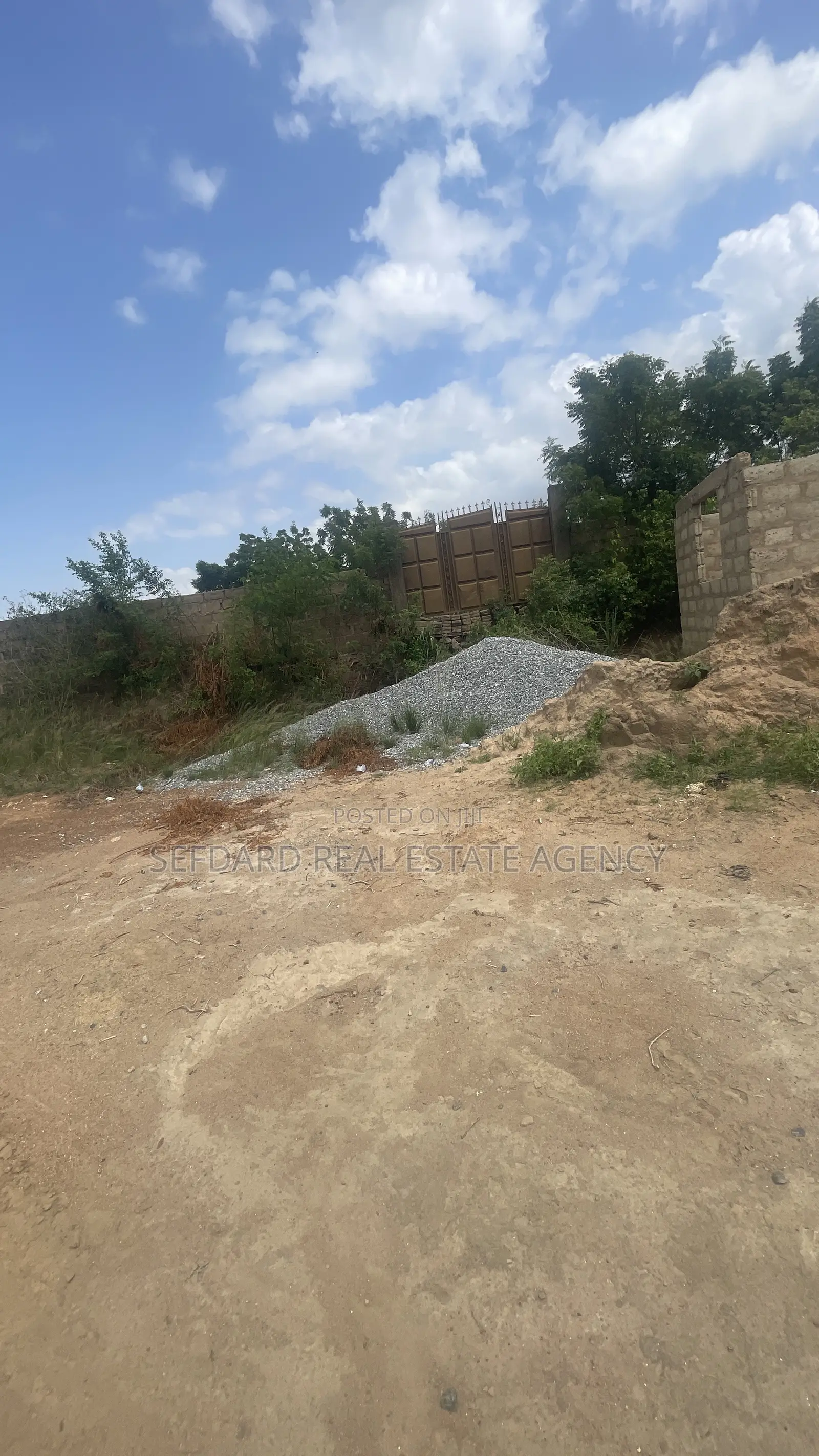 Wall and Gated 4 Plots of Land for Sale at Amasaman .
