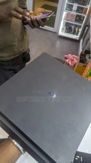 Nice Playstation 4 Slim Machine With 8 Games at Cool Price