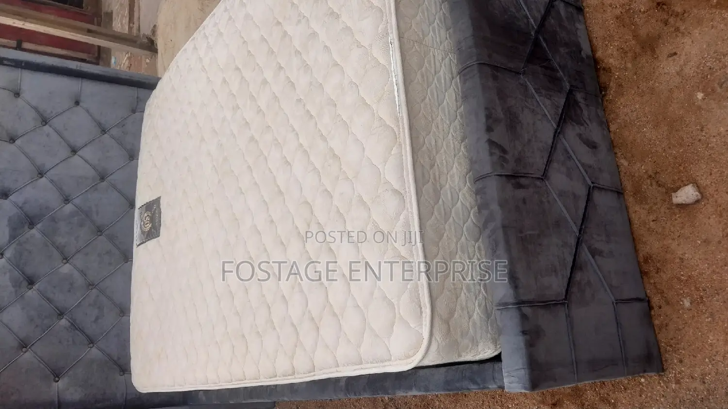 Gray Bed With Foreign Matress