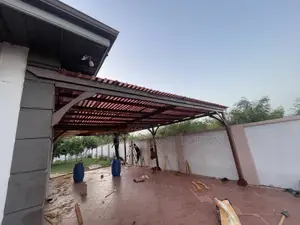 Pergola Attached to a War