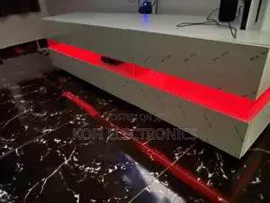 High Gloss Tv Stand in White With a Touch of Ambiance