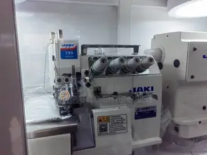 Four Thread Knitting Machine