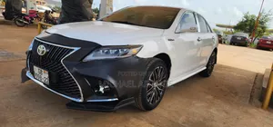 Photo - Toyota Camry LE 4dr Sedan (2.5L 4cyl 6AM) 2010 White
