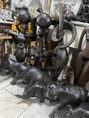 Carved Wooden Arts Sculptures Available in Different Designs