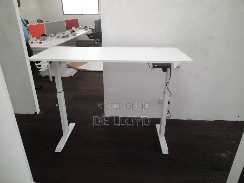 Electric Adjustable Table (140 Cm By 60 Cm )