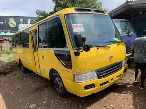 Toyota Coaster 2014 Yellow