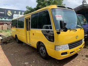 Toyota Coaster 2014 Yellow