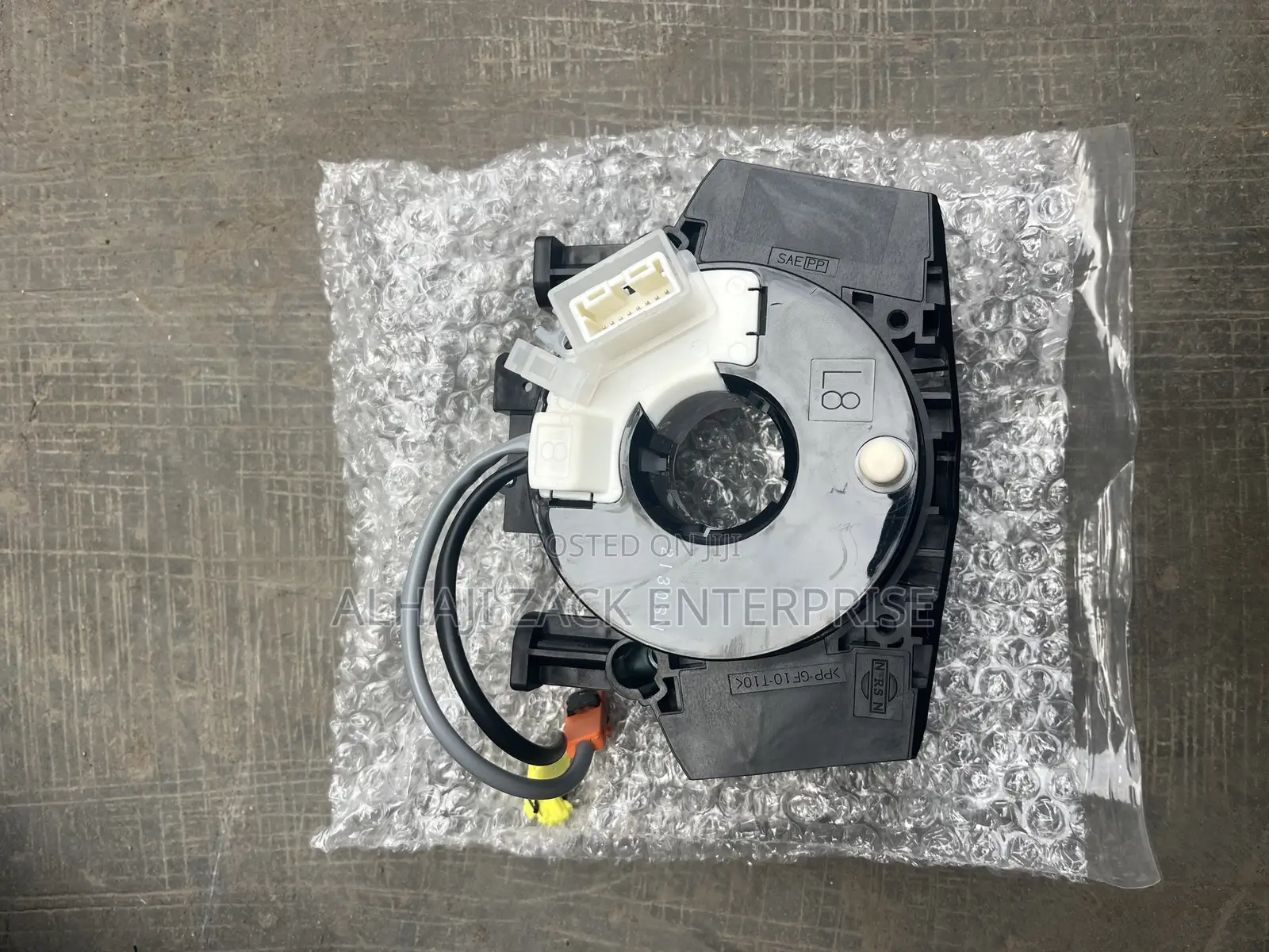 Nissan Versa Horn Plate ( Spiral Cord )