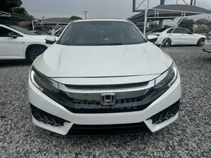 Photo - Honda Civic Touring Sedan 2018 White