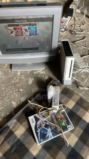 Complete Nintendo Wii Console With Pokémon Battle Game Game
