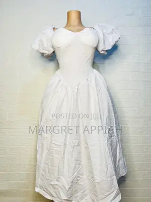 Photo - Vintage White Dress With Puffy Sleeves and Corset Top.