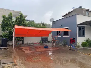 Orange Carport to Match Roofing