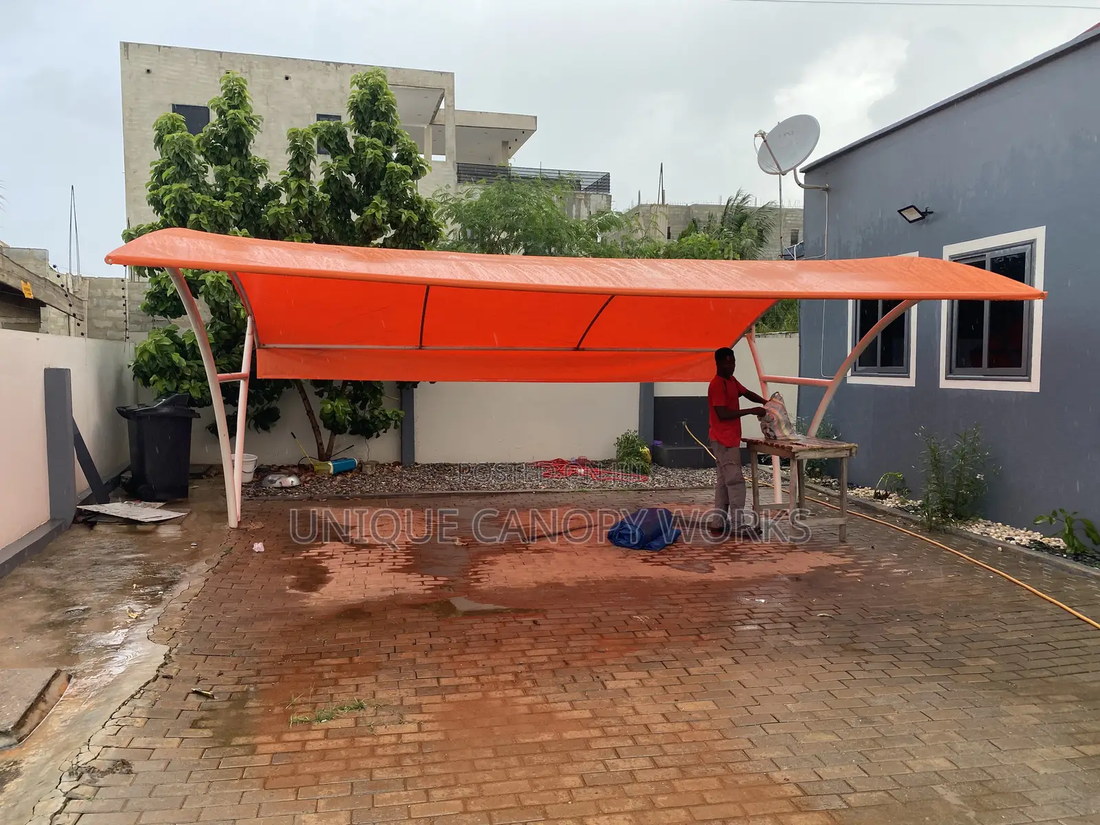 Orange Carport to Match Roofing