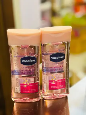 Photo - Vaseline Cocoa Radiant Body Oil + Vitamin B3 Body Oil