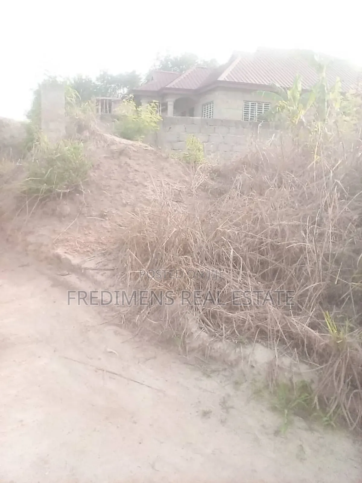 Land on Main Road at Aputuogya for Sale