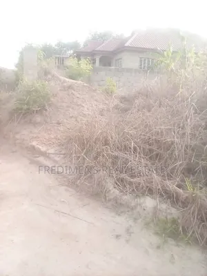 Land on Main Road at Aputuogya for Sale