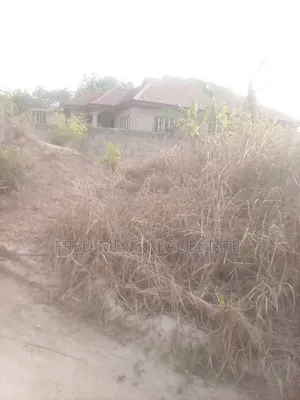 Land on Main Road at Aputuogya for Sale