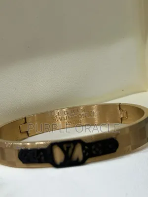 Photo - Louis Vuitton Engraved Bracelet.