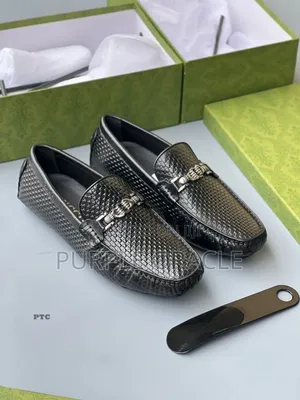 Gucci Men's Brown Woven Leather Loafers