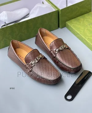 Gucci Men's Brown Woven Leather Loafers