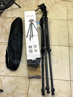 Wt-3560 Tripod ( Cameras and Phones )