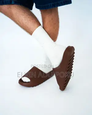 Adidas Yeezy “Flax” Slides.