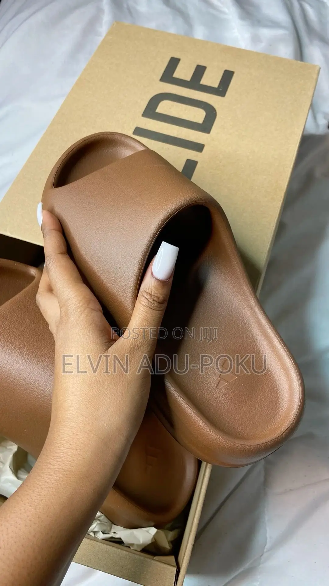 Adidas Yeezy “Flax” Slides.
