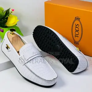 Photo - White Tod’S Loafer