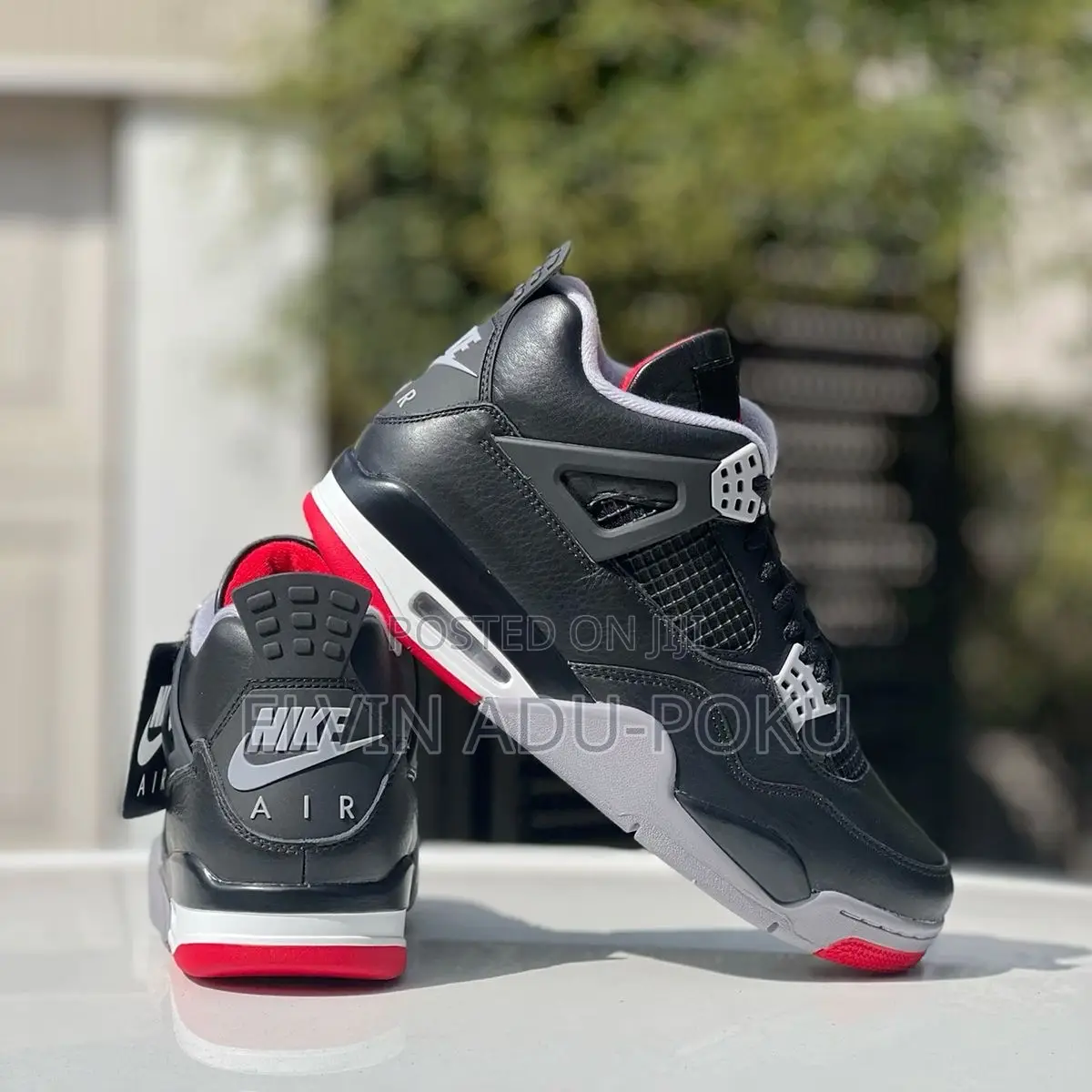 Air Jordan 4 "Bred Reimagined" Sneakers.