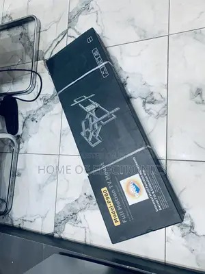 Photo - Easy To Fix Adjustable Wall Tv Bracket For 50-120 Inches