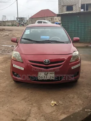 Photo - Toyota Yaris Base Sedan 4dr 2010 Red