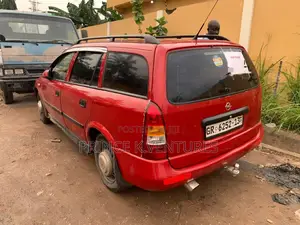 Photo - Opel Astra 1.6 Caravan CNG 2005 Red