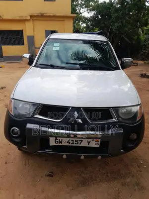 Photo - Mitsubishi L200 Double Cab 2.5 180hp 4WD 2009 White