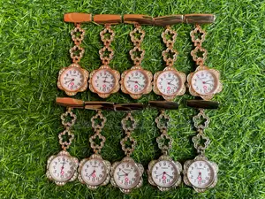 Photo - Metallic Breast Watch